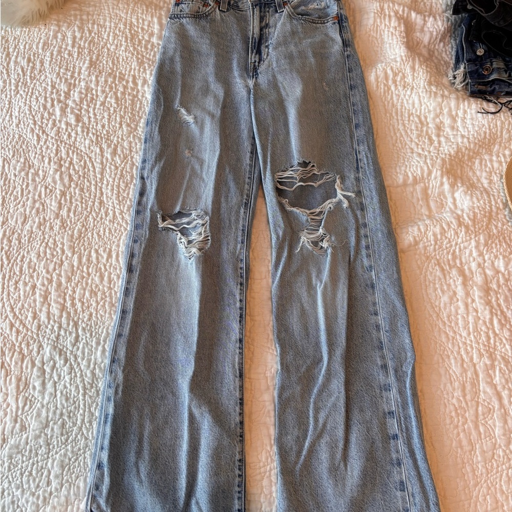 Levi's rib cage high Light Blue Distressed Flare Jeans